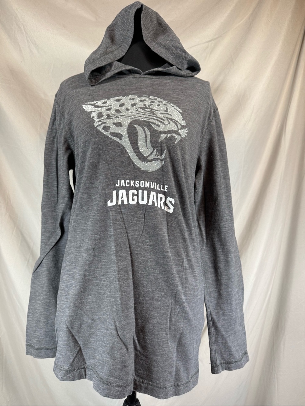 NFL Team Apparel Jacksonville Jaguars Glitter-Effect Hooded Long-Sleeve Tee Gray